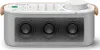 A white Sony SRS-LSR200 portable speaker with a gray speaker grille and wooden accents. Voir les images du produit
