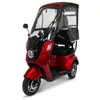 A red three-wheeled scooter with a canopy and windshield, shown against a white background. Produktbild-Vorschau