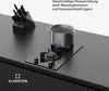 A gas cooktop with a pot of boiling water on it, next to a knife block. Produktbild-Vorschau