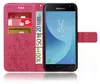 A pink wallet-style phone case with a Samsung phone inside, along with credit cards and euro banknotes. Produktbild-Vorschau