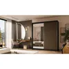 A bedroom scene featuring a wardrobe, dressing table, and bed. Produktbild-Vorschau