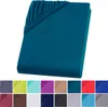 A teal fitted sheet is shown diagonally against a white background. Below the sheet are swatches of different colored fitted sheets. Produktbild-Vorschau
