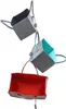 Three felt bags are suspended in the air against a white background. Produktbild-Vorschau