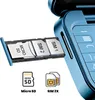 A close-up of a blue flip phone's SIM and SD card tray, with icons and text indicating its features. Podgląd zdjęcia produktu
