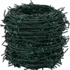 A roll of dark green barbed wire is stacked on top of other rolls. Produktbild-Vorschau