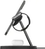 A charging stand for a smartphone and smartwatch, with wireless earbuds on the base. Produktbild-Vorschau