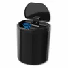 A black sensor trash can with its lid open, showing a blue sensor light. Anteprima dell’immagine prodotto