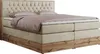 A king-size boxspring bed with a tufted headboard and wooden base. Produktbild-Vorschau