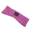 A pink and purple heathered fabric headband with a small black control module embedded in it. Náhled obrázku produktu