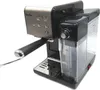 A black and silver Breville espresso machine with a clear water tank is shown against a white background. Produktbild-Vorschau