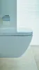 A close-up view of a modern wall-mounted toilet with a toilet paper holder mounted on the wall. Produktbild-Vorschau