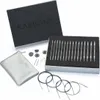 A set of knitting needles and accessories is displayed on a white background, with the product box open. Produktbild-Vorschau