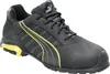 A black and yellow Puma safety shoe is shown against a white background. Voir les images du produit