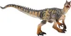 A toy dinosaur figure on a white background. Náhľad obrázku produktu