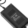 A close-up of a black power charger with text and symbols on it. Anteprima dell’immagine prodotto
