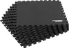 A stack of black interlocking foam floor mats. Produktbild-Vorschau