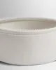 Close-up of a round fabric basket with white stitching. Produktbild-Vorschau