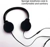 A pair of black headphones with sponge earphone cases is shown against a white background. Produktbild-Vorschau