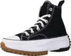A black Converse Run Star Hike Jwa sneaker with a white sole and laces, and a brown rubber sole. Voir les images du produit
