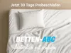 A neatly made bed with a white pillow and duvet, suggesting comfort and sleep. Produktbild-Vorschau