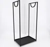 A black metal firewood rack with a tray at the bottom, shown against a white background. Produktbild-Vorschau