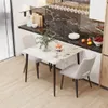 A modern dining set with a marble-look table and chairs in a well-lit room. Produktbild-Vorschau