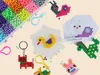 A collection of colorful water beads and various DIY crafts made from them, including animals and keychains. Náhľad obrázku produktu