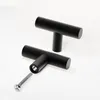 Two black cabinet handles with a screw are displayed on a white background. Produktbild-Vorschau