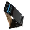 A guitar accessory, specifically a foot pedal stand, is shown against a white background. Náhled obrázku produktu