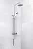 A shower filter system mounted on a tiled wall. Voir les images du produit