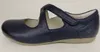 A side view of a single navy blue leather Mary Jane shoe against a white background. Voir les images du produit