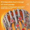 Close-up of a head massager with multiple massage nodes. Produktbild-Vorschau