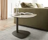 A modern living room setting with a sofa, curtains, and a side table. Produktbild-Vorschau