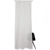A white sheer curtain hangs from a rod, with a black chair partially visible behind it. Produktbild-Vorschau