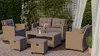 A rattan-style outdoor furniture set is arranged on a patio with a green hedge and a white curtain in the background. Produktbild-Vorschau