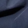 Dunkelblaue Softshell-Stoffstruktur mit feinem Gewebe und leichter Faltenbildung Produktbild-Vorschau