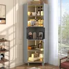 A gray corner cabinet with multiple shelves filled with various decorative items and products, placed in a room with a window and blinds. Produktbild-Vorschau