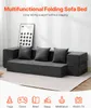 A dark gray multifunctional folding sofa bed is shown in a living room setting, with a framed picture on the wall behind it. Below the sofa, icons illustrate various uses of the product. Voir les images du produit