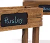 Close-up of a wooden planter box with a chalkboard label. Produktbild-Vorschau