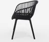 A black chair shown from the side against a white background. Produktbild-Vorschau