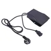 A black foot pedal with a power cord and plug on a white background. Podgląd zdjęcia produktu