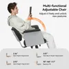 A man is sitting in an adjustable office chair, demonstrating its features. Podgląd zdjęcia produktu