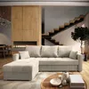 A modern living room with a sectional sofa, fireplace, and staircase. Produktbild-Vorschau