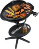 An electric grill with food on it, placed on a stand with a shelf below. Podgląd zdjęcia produktu