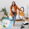 A woman is vacuuming a room with a vacuum cleaner. There is a circular overlay with vacuum cleaner bags and leaves. Voir les images du produit