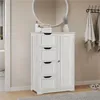 A white bathroom cabinet with four drawers and a single door, placed in a bathroom setting with a mirror and towels in the background. Produktbild-Vorschau