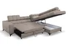 A beige sectional sofa with its sleeping surface and storage compartment extended. Produktbild-Vorschau