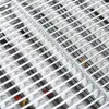 A close-up view of a stainless steel grill grate. Produktbild-Vorschau