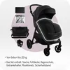 A black stroller with accessories displayed next to it, against a light gray background. Náhľad obrázku produktu