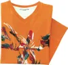 A folded orange t-shirt with a colorful abstract print. Produktbild-Vorschau